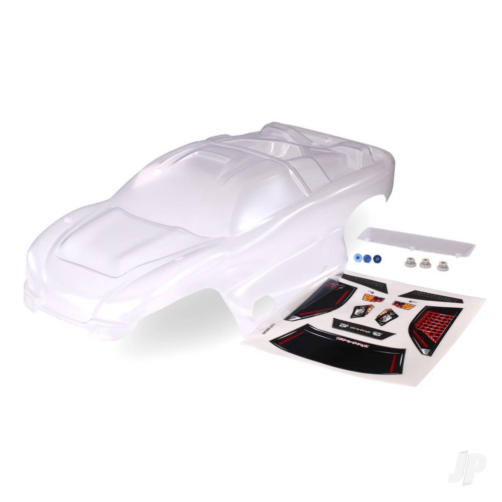Traxxas Body, Nitro Rustler (Clear, requires painting) / window, grille, lights decal sheet / wing and aluminium hardware