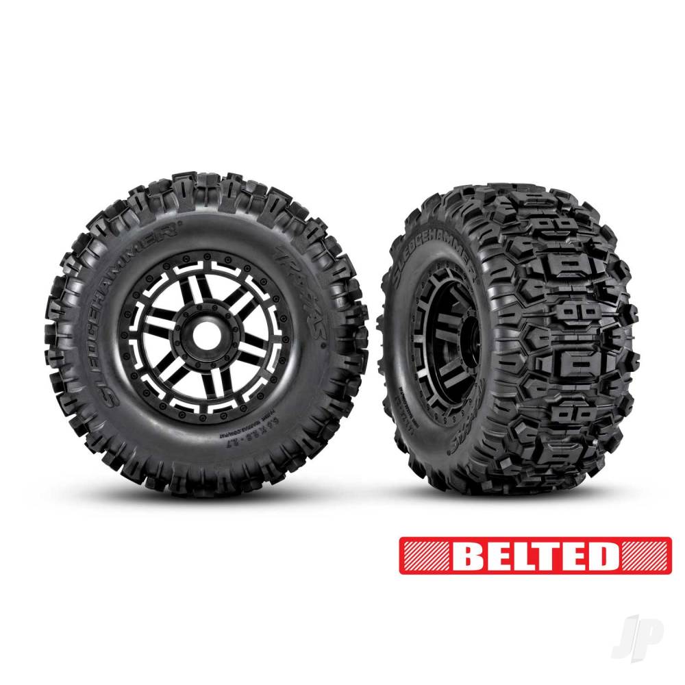 Traxxas Tyres & Wheels, Assembled, Glued (Black wheels, belted Sledgehammer All-Terrain tyres, dual profile (2.9in outer, 3.8in inner), foam inserts) (2) (17mm splined) (TSM rated)